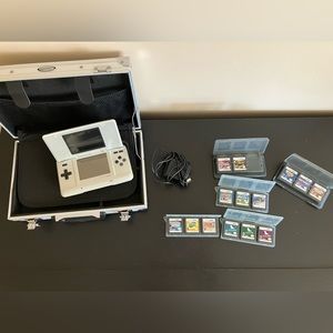 Nintendo DS, plus games, charger and case